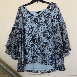 Light and dark blue flowered blouse